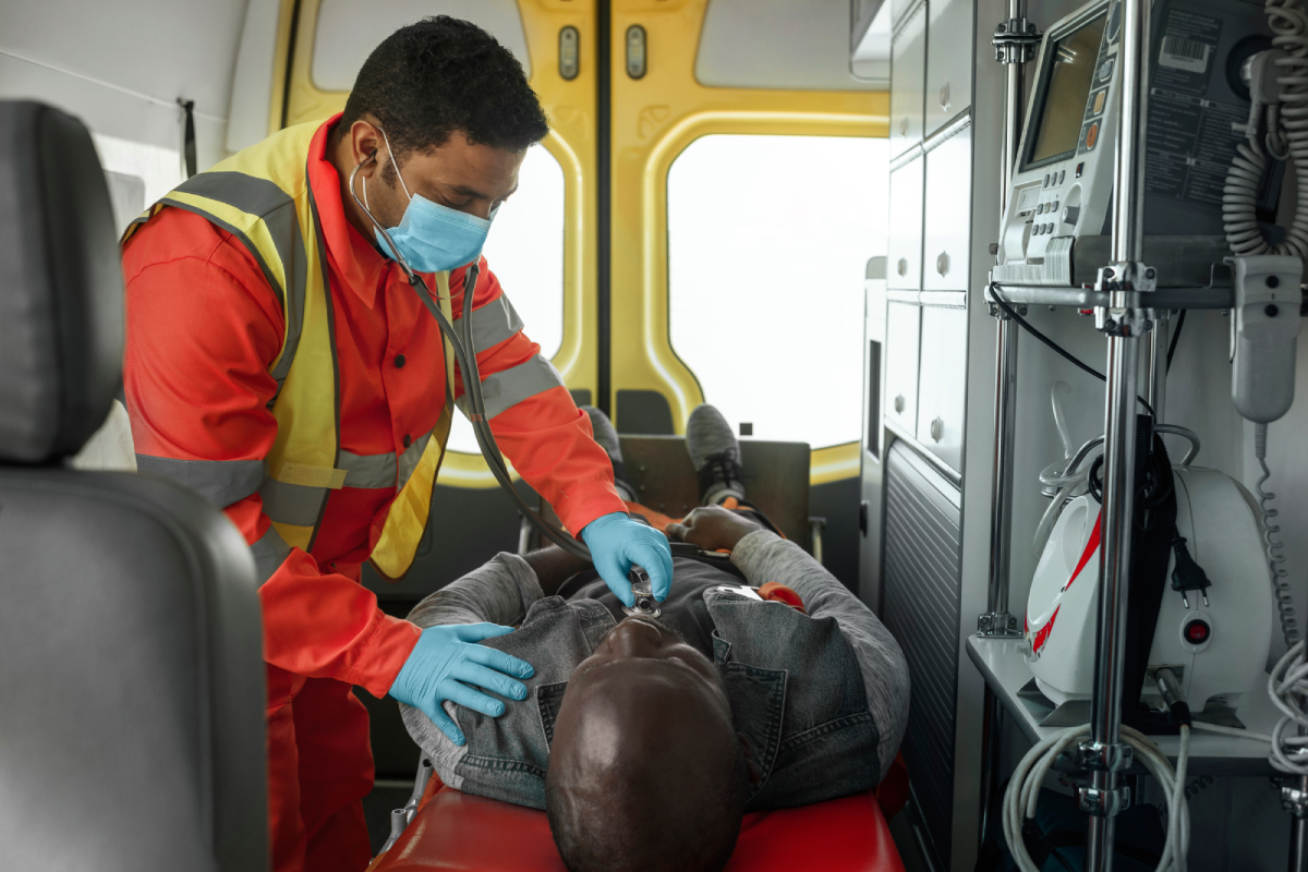 aamedium shot paramedic checking victim
